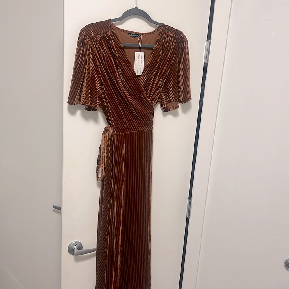 Ladies wrap dress, mid leg length, soft fabric, rich warm color. NWT